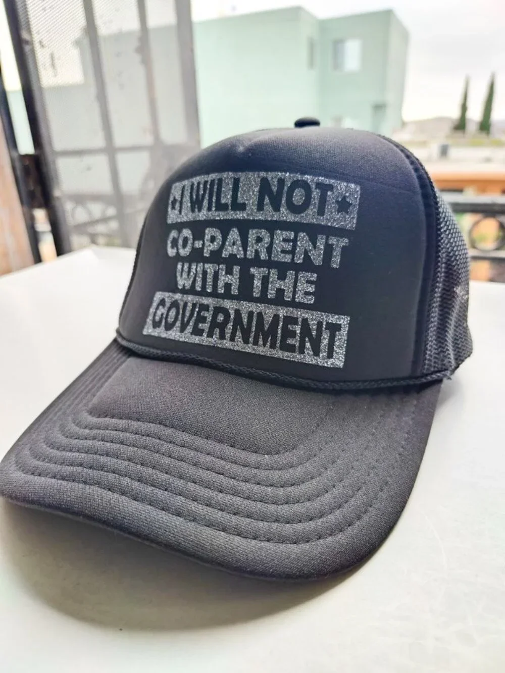 Black Trucker Hat “I Will Not Co-Parent With the Government” Mesh Snapback